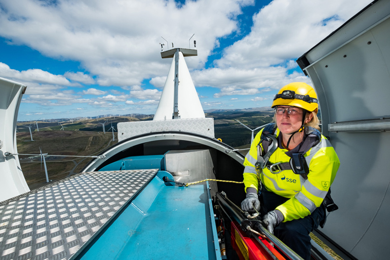 Woman working on wind farm