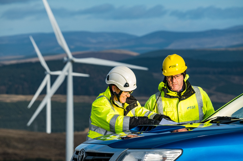 Male and female SSE engineers in the field